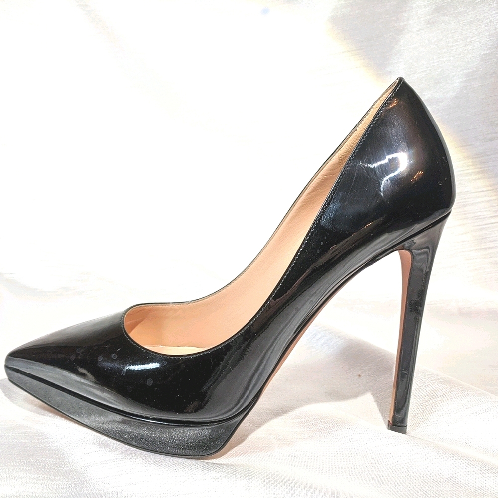 Valentino black patent leather platform pumps.